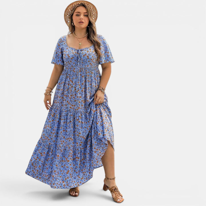 Breezy floral maxi dress, an elegant women's summer design for casual or vacation days. Soft feel.