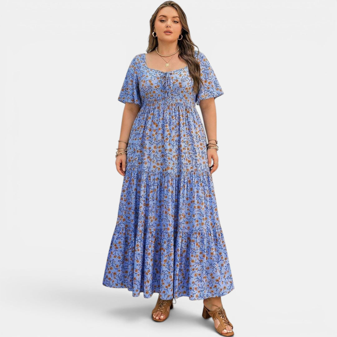 Beautiful floral maxi dress for women, an elegant flowing A-line summer choice. Perfect for events.