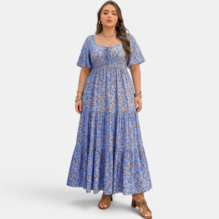 Beautiful floral maxi dress for women, an elegant flowing A-line summer choice. Perfect for events.