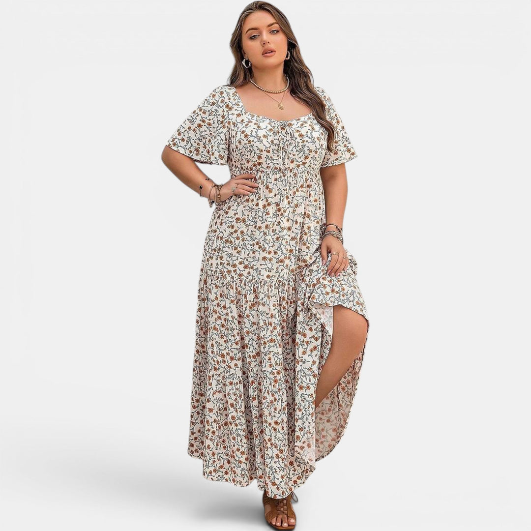 Elegant women's maxi dress featuring a beautiful floral pattern. Perfect for summer events.