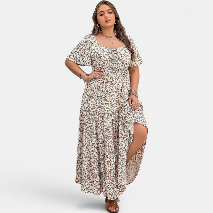 Elegant women's maxi dress featuring a beautiful floral pattern. Perfect for summer events.