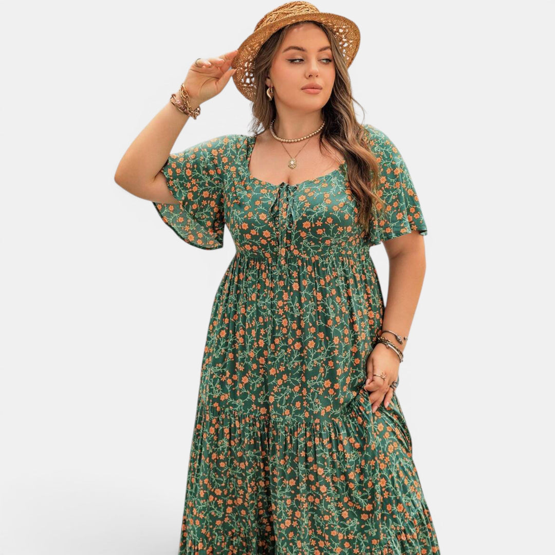 Women's long floral maxi dress, an elegant A-line design for summer comfort and style.