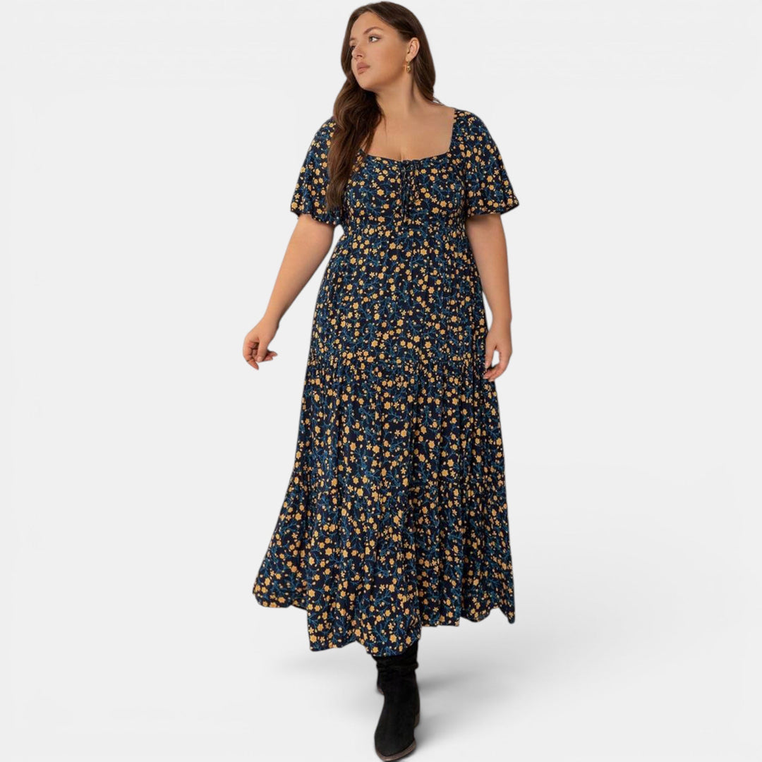 Casual women's floral print maxi dress, elegant and breezy, perfect for warm weather.