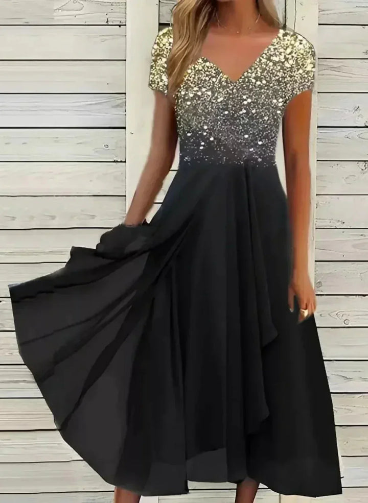 Glamorous multicolor floral maxi dress for women, suitable as a wedding guest or elegant party dress. Romantic design.