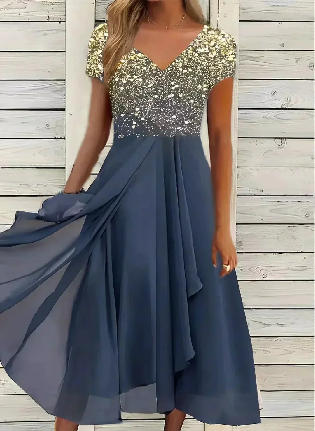 Women's sophisticated floral evening dress, a perfect wedding guest or special occasion gown. Elegant and glamorous.