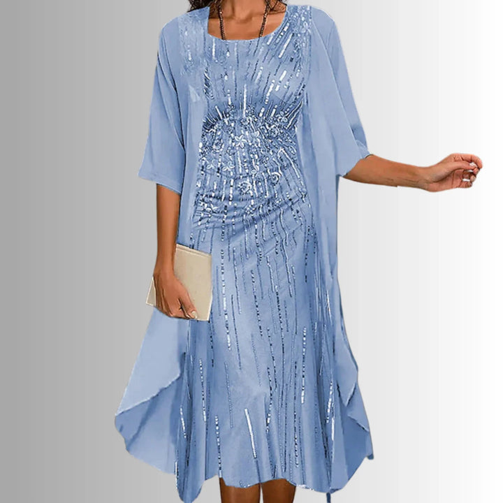 Chic 3/4-sleeve jacket with floral print, designed to complement the elegant midi dress.