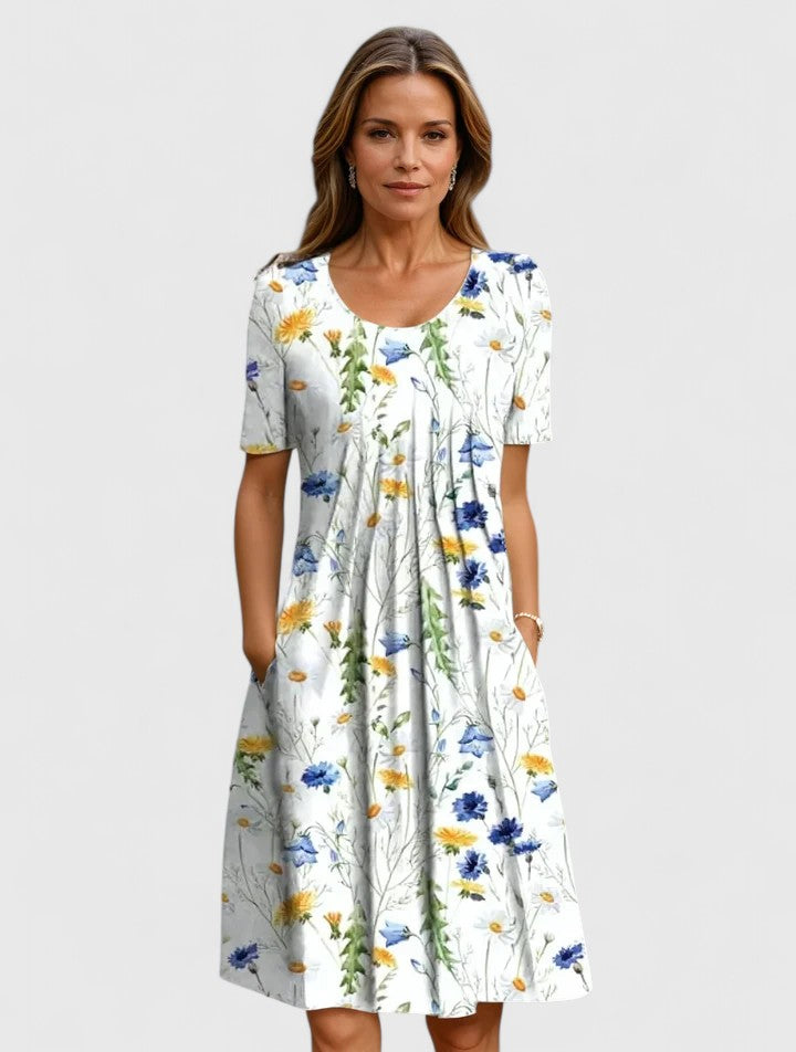 Women's elegant floral midi dress with a flattering fit, perfect for summer occasions and versatile styling.