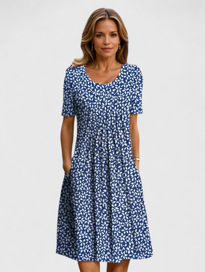 Flattering women's floral midi dress, designed for comfort, easily styled for summer fashion or evening parties.