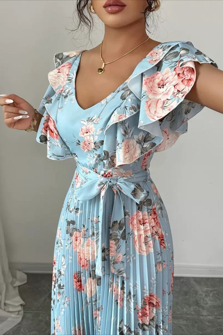 Vibrant floral print women's maxi dress, pleated silhouette, and sweet ruffle sleeves for elegance.