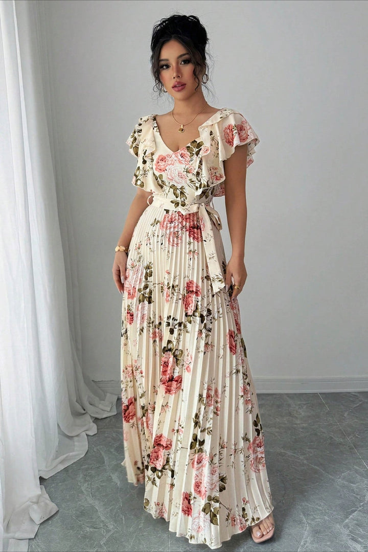 Elegant women's pleated maxi dress with a vibrant floral pattern and charming ruffle sleeves.