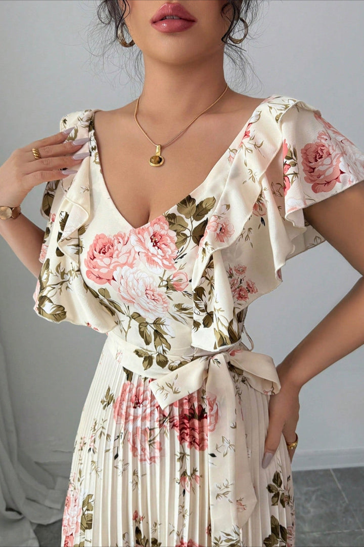 Women's wedding guest floral maxi dress, pleated design, and sophisticated ruffle sleeves.