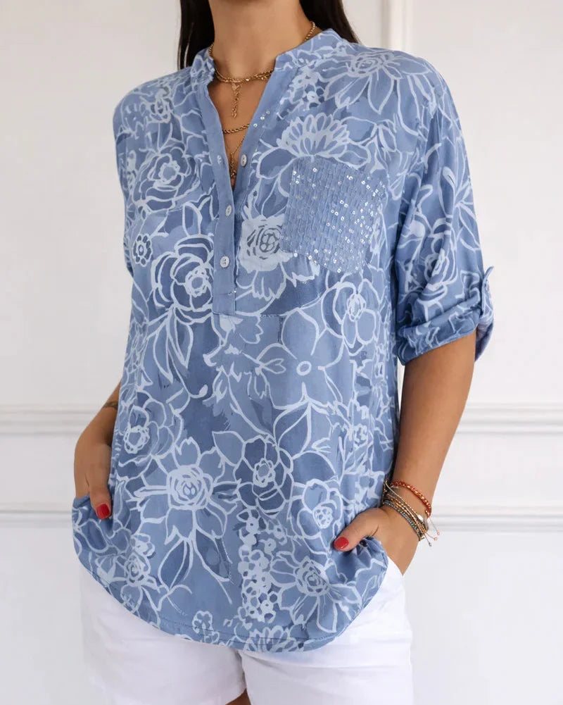 Comfortable women's elegant floral pocket blouse. Relaxed fit, stylish everyday top.