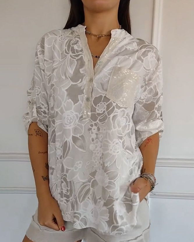 Lightweight women's floral blouse, elegant & stylish with a front pocket. Comfortable daily top.