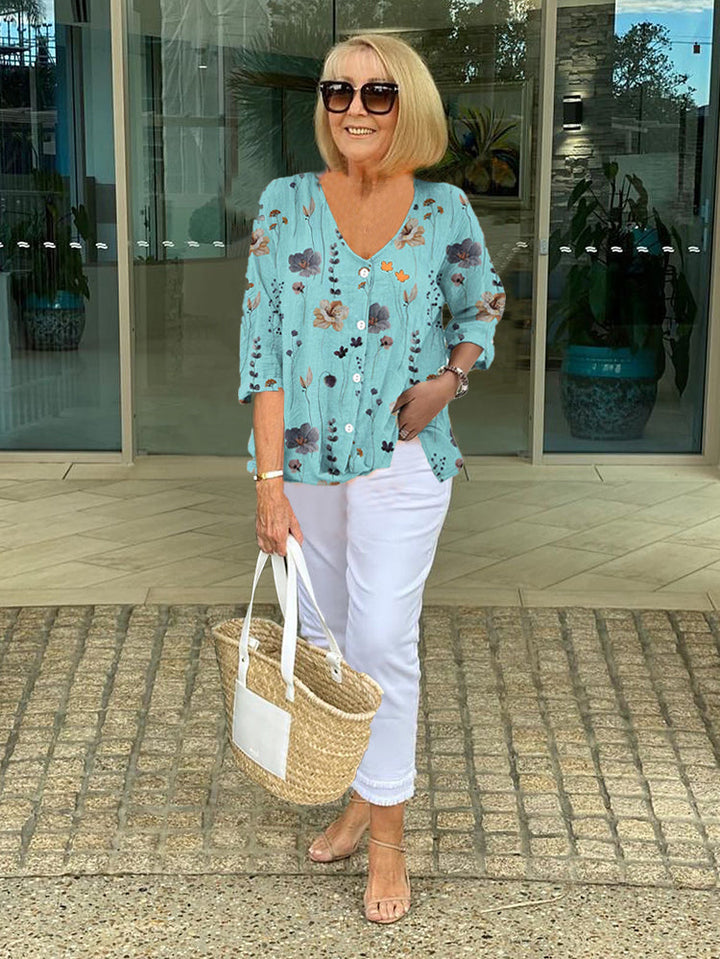 Women's elegant floral print blouse with round neck, perfect for spring/summer casual chic style.