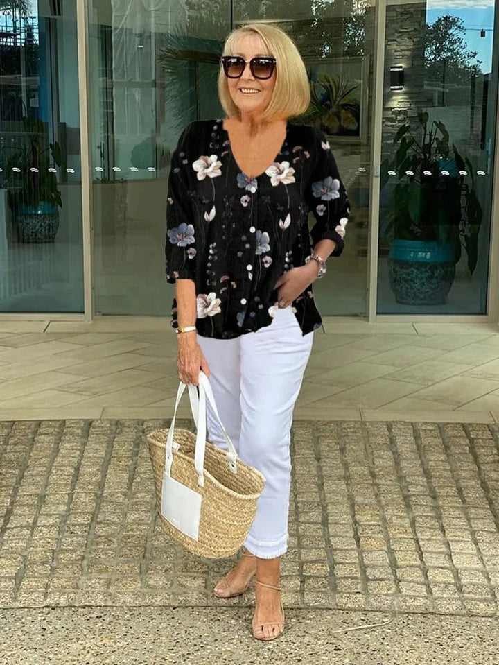 Stylish women's round neck floral print blouse, an elegant top perfect for spring and summer everyday fashion.