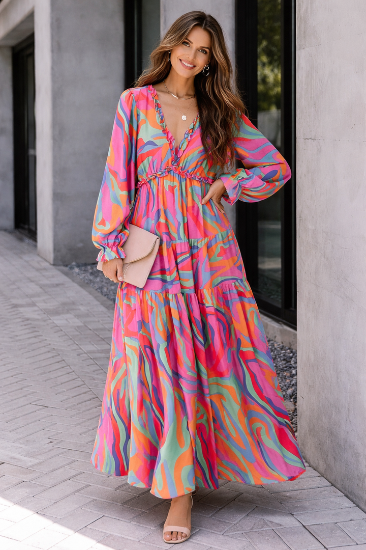 Long sleeve floral maxi dress for women, featuring a flattering V-neck and delicate ruffle detailing, casual or formal.