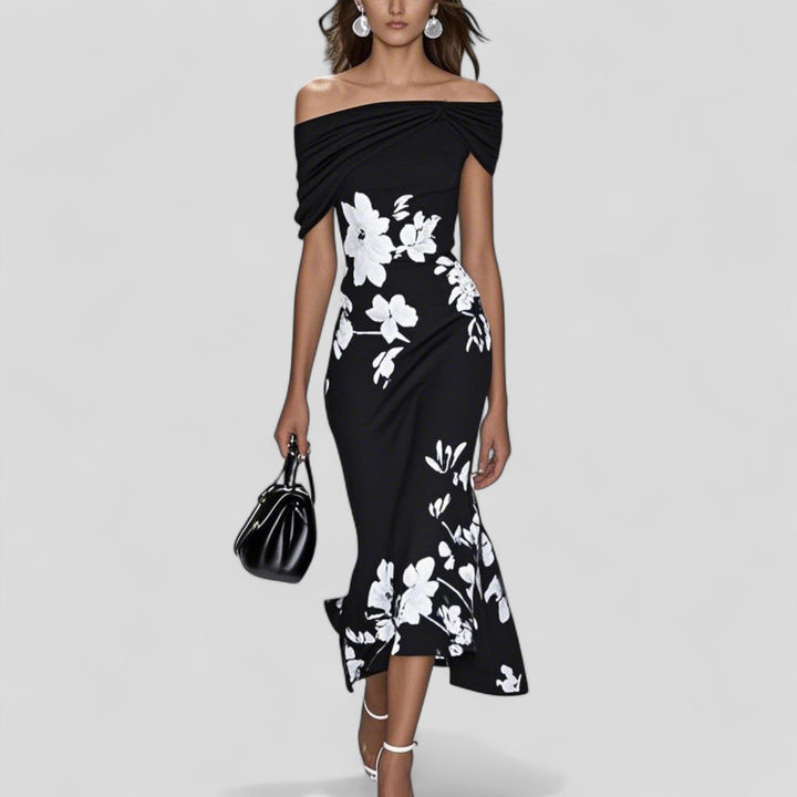Comfortable women's floral midi dress. Relaxed fit, elegant style for summer, party, or resort wear.