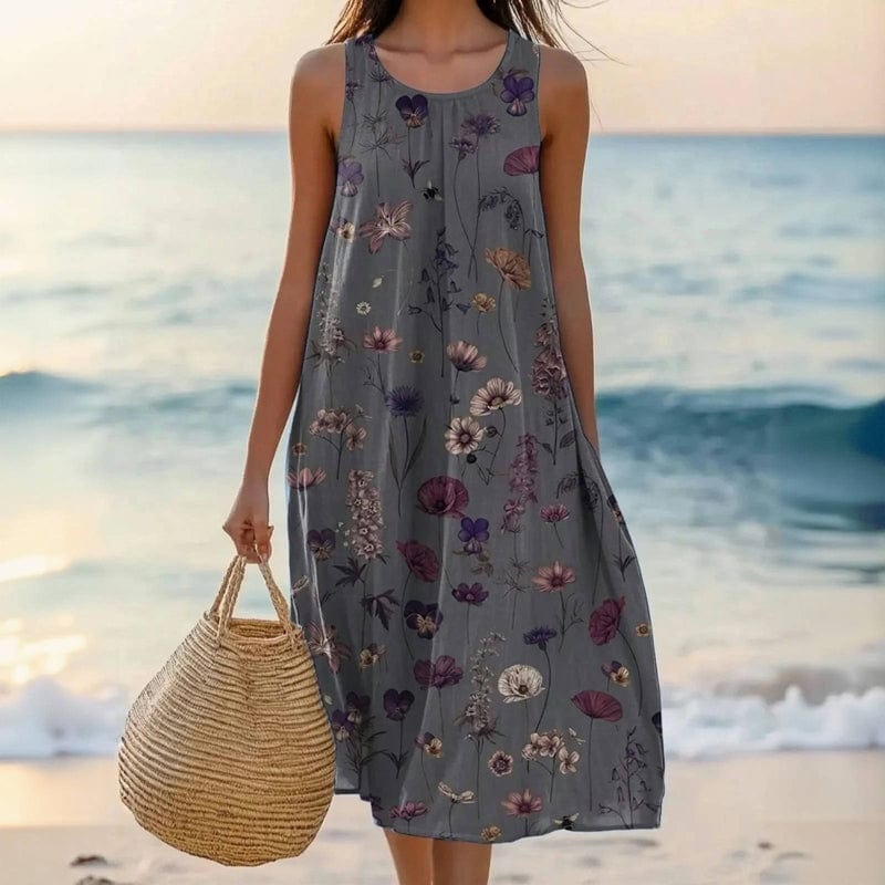 Stylish women's sleeveless floral midi dress for summer. Flowy & comfortable, perfect for casual or elegant everyday wear.