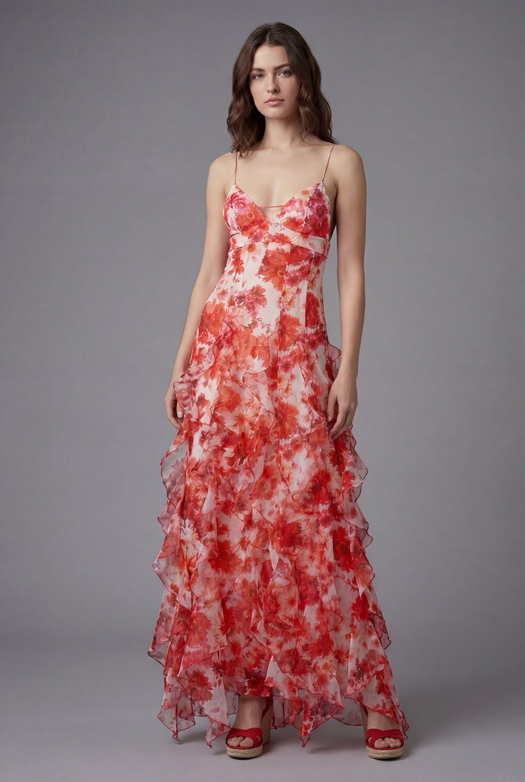 Women's elegant floral print ruffled maxi dress for summer occasions.