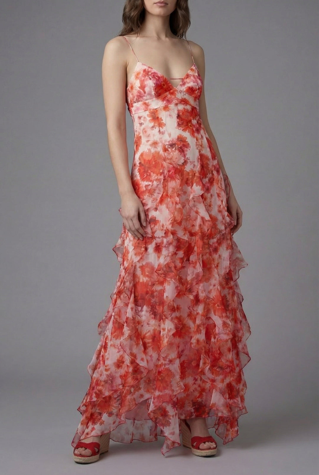 Chic women's floral maxi dress with ruffled details, perfect for summer.