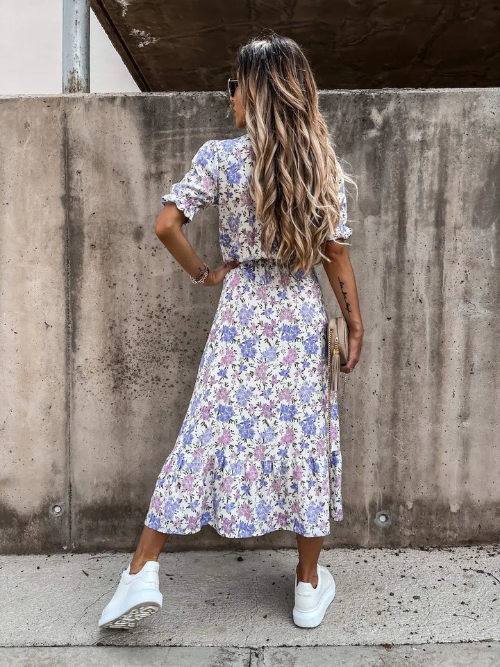 Elegant women's floral summer dress, lightweight for holidays, vacations, or daily wear.