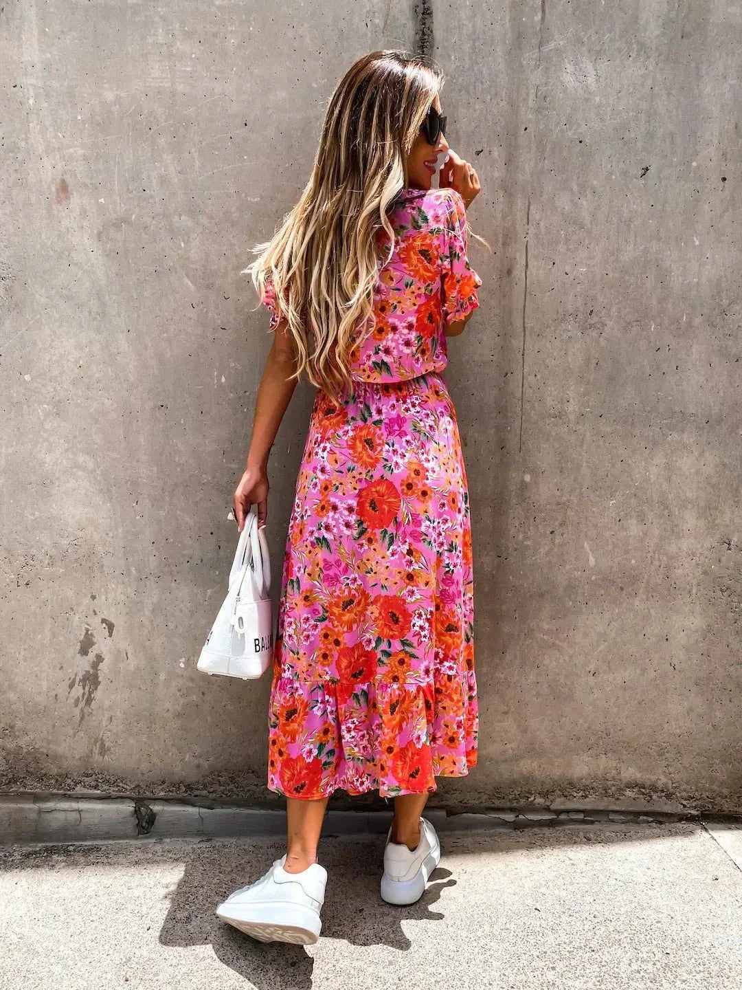 Vibrant floral print women's summer dress, elegant and perfect for casual or party wear.