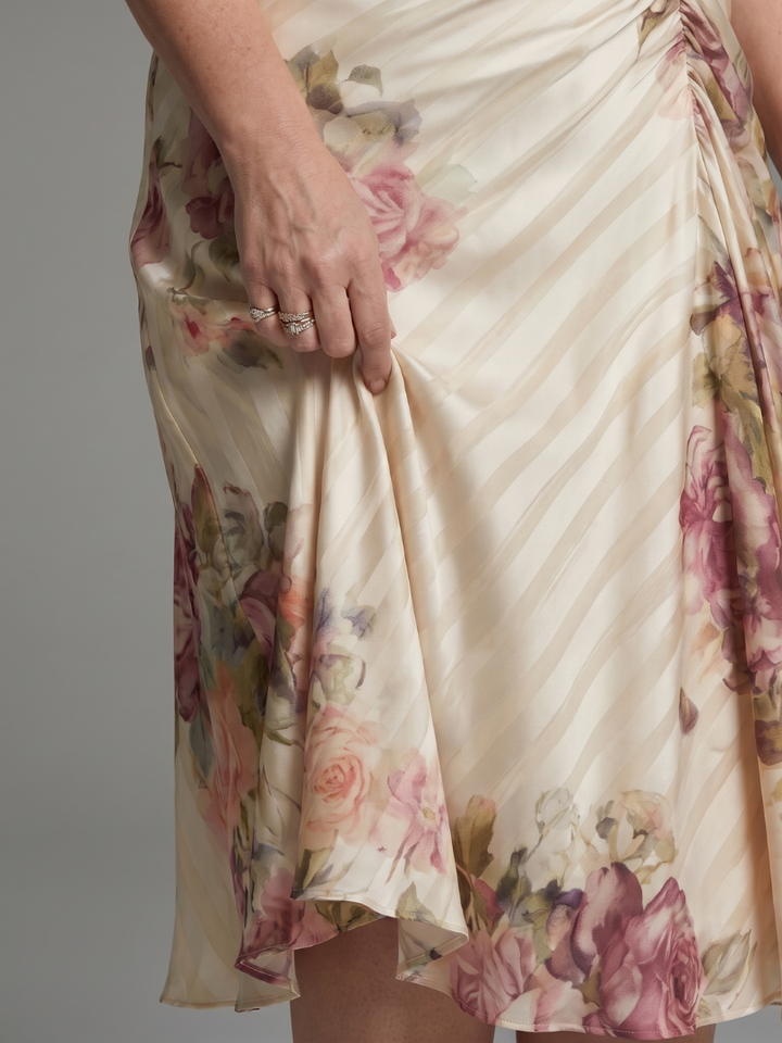 Comfortable women's wrap midi dress with delicate flutter sleeves & a beautiful floral print, great for casual summer wear.