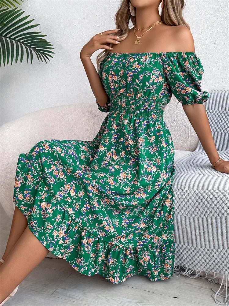 Chic women's floral midi dress with smocked elastic and romantic puff sleeves.