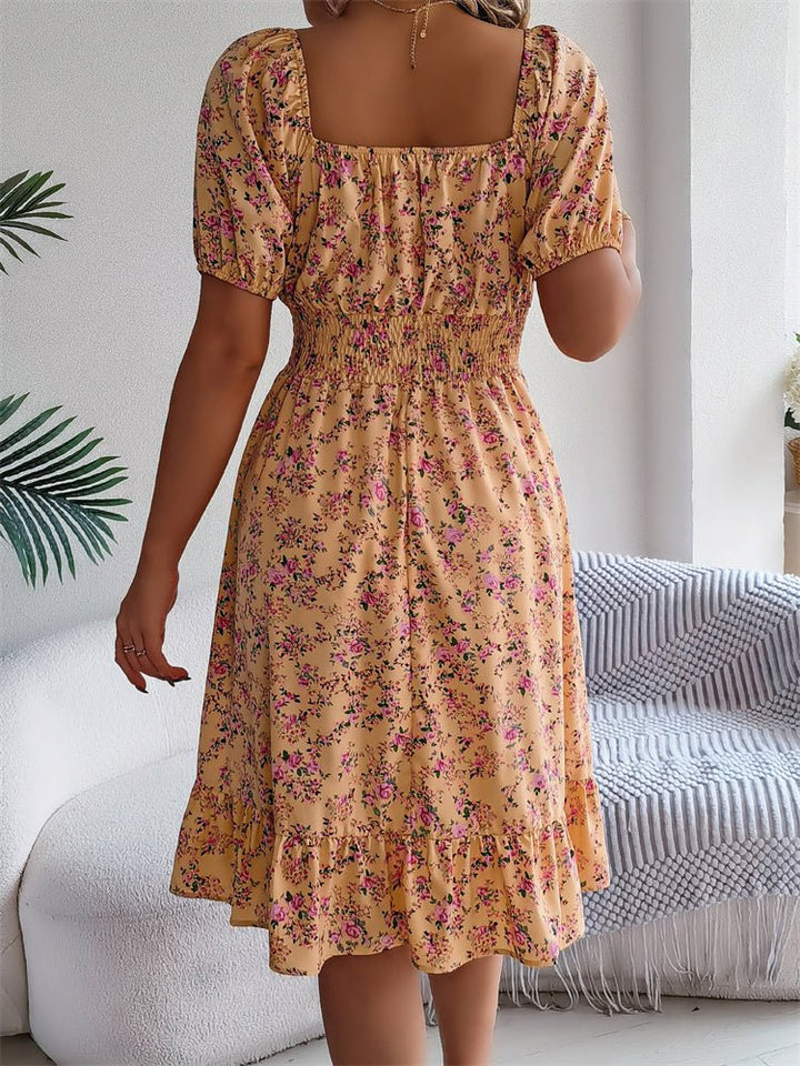 Women's casual floral smocked midi dress, puff sleeves, a comfortable and stylish summer choice.