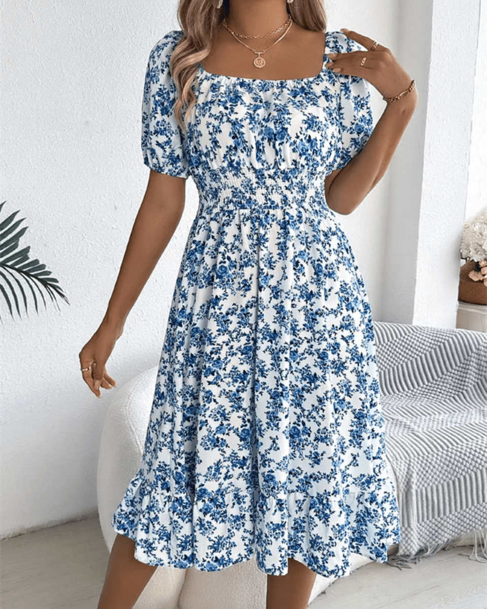 Autumn style women's floral midi dress, smocked and puff sleeve design, elegant and trendy.
