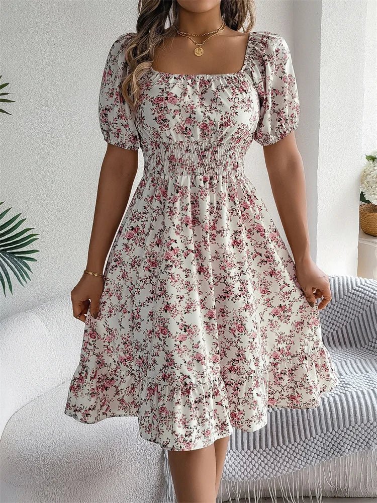 Women's versatile midi dress, floral print, smocked, puff sleeves. Suitable for day or evening.
