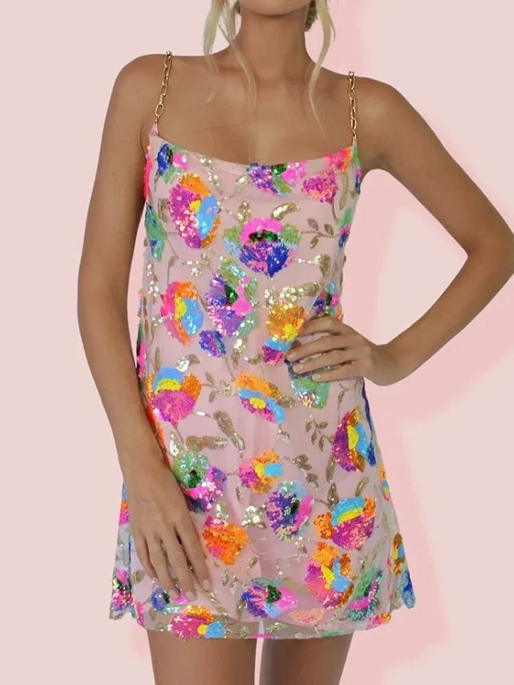 Stylish women's floral summer mini dress, vibrant print, spaghetti straps, perfect casual party wear.