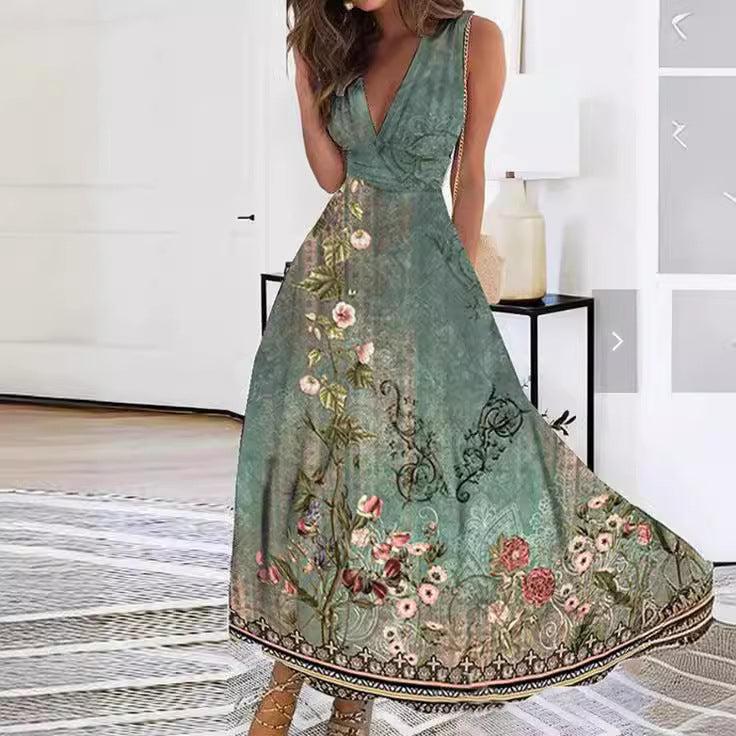 Beautiful sleeveless floral print maxi dress with a V-neck and A-line skirt, ideal for summer weddings.