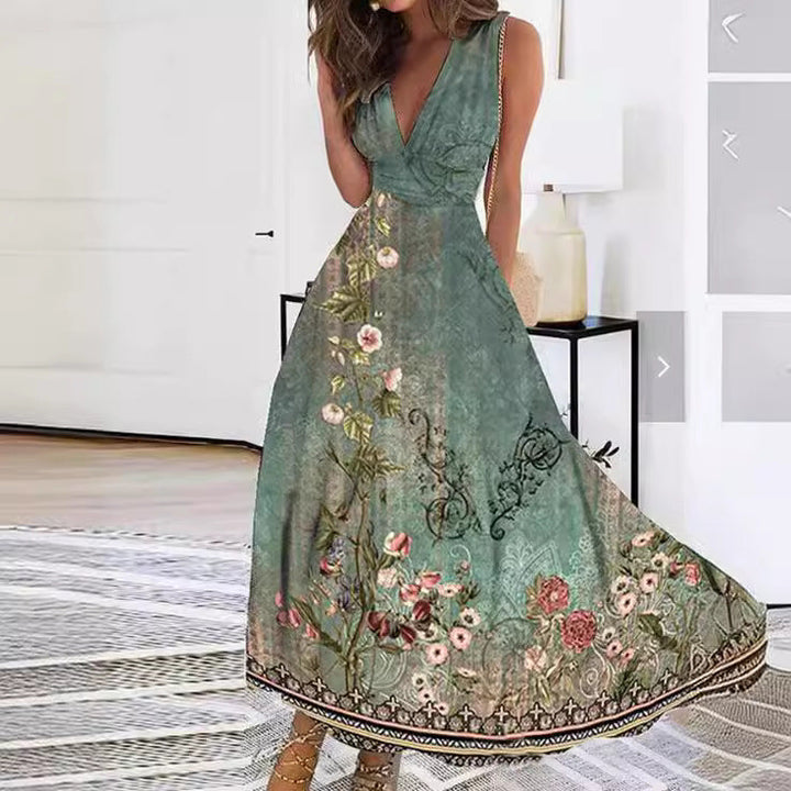 Beautiful sleeveless floral print maxi dress with a V-neck and A-line skirt, ideal for summer weddings.
