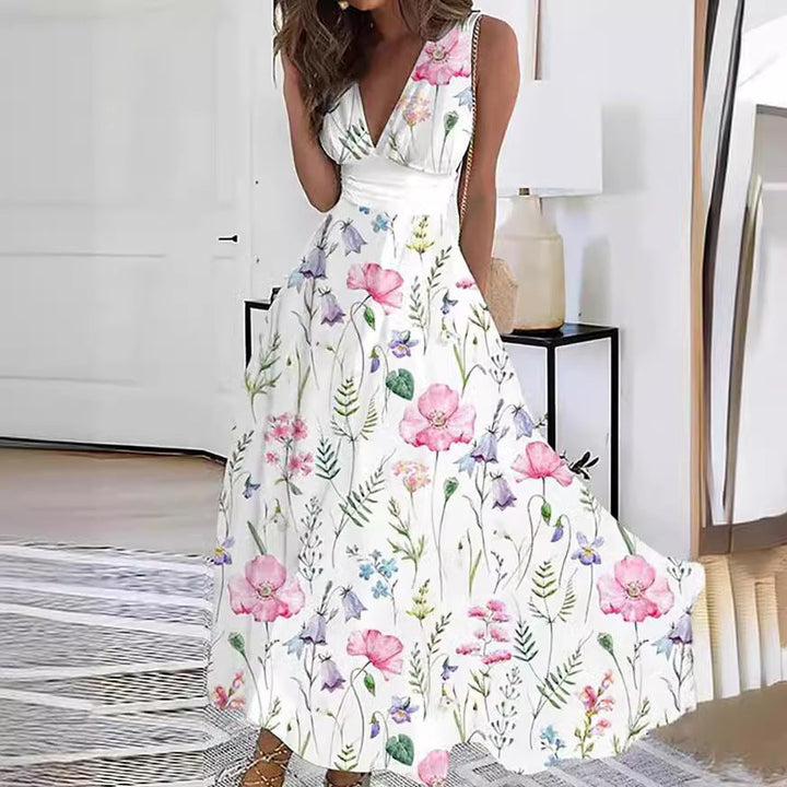 Long women's party dress featuring a vibrant floral pattern, V-neckline & flowing A-line silhouette.