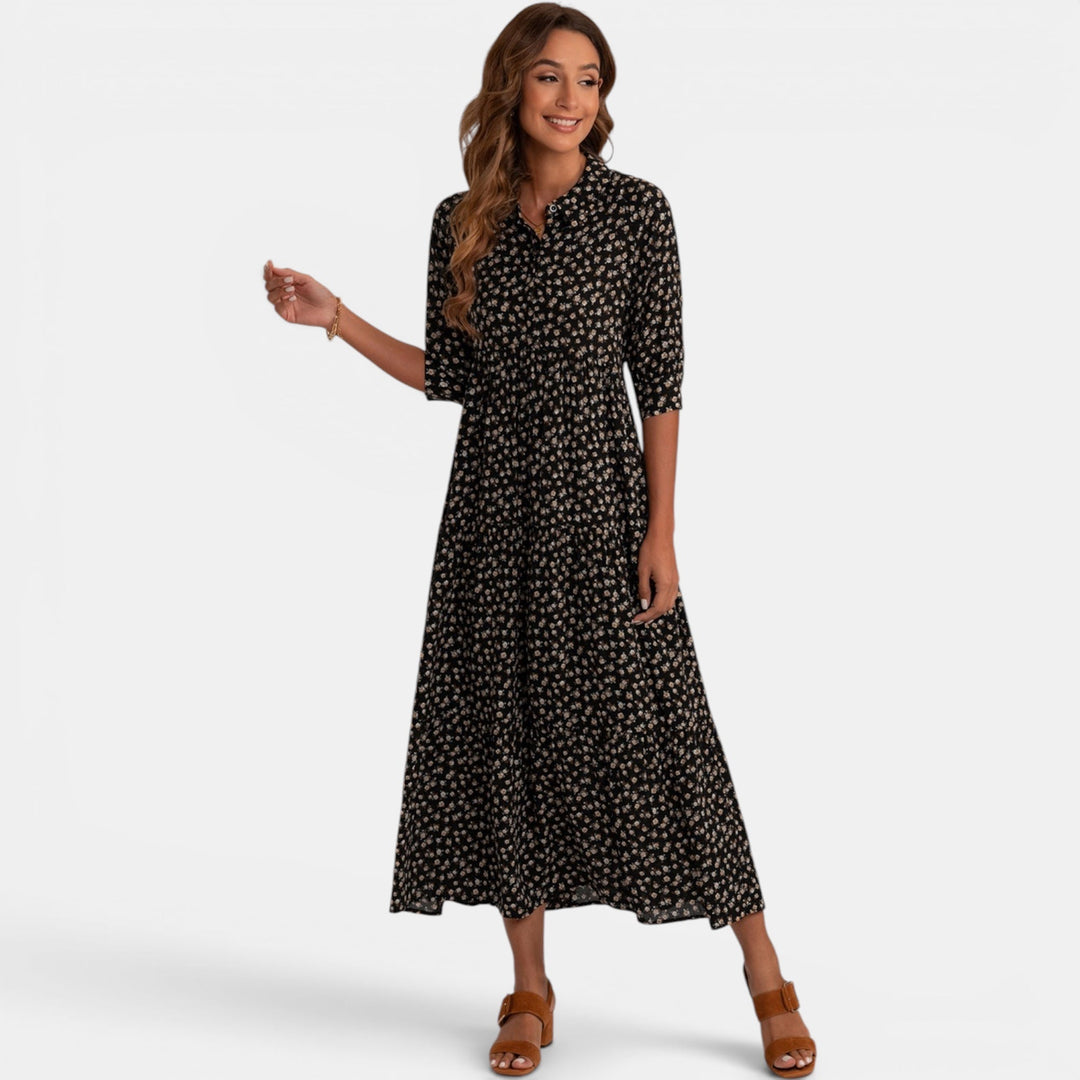 Women's elegant floral V-neck maxi dress with half sleeves, perfect for summer casual wear.