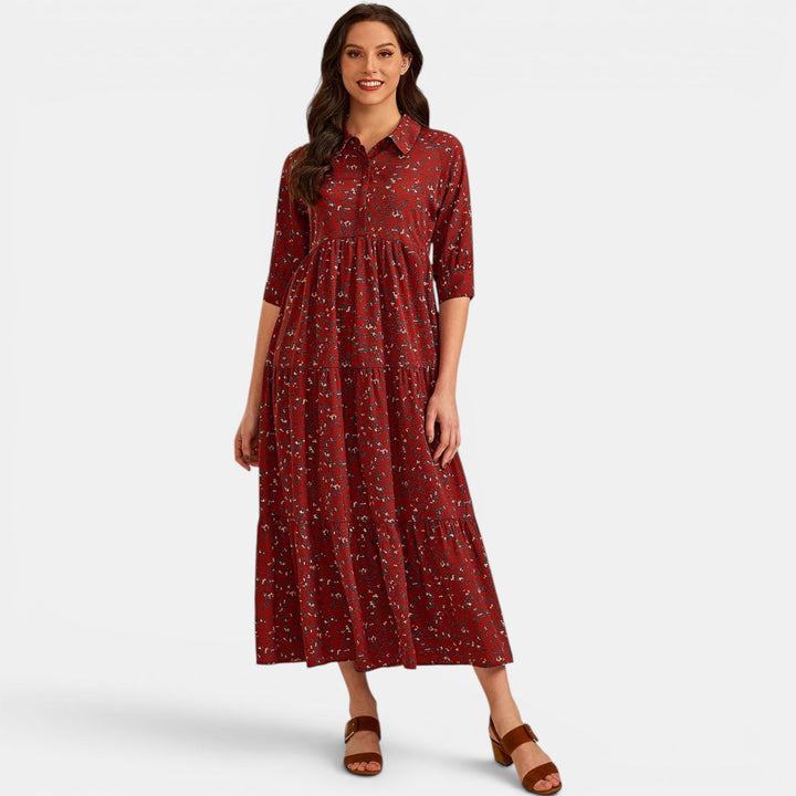 Chic women's floral print V-neck maxi dress with half sleeves, perfect for versatile wear.