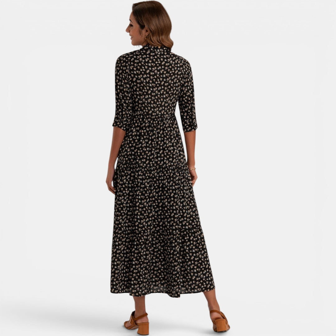 Elegant women's V-neck floral maxi dress, flowy silhouette, comfortable and fashionable.