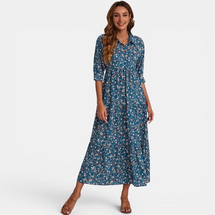 Stylish women's V-neck maxi dress, vibrant floral print, comfortable relaxed fit.