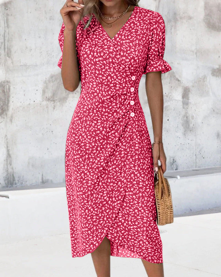 Feminine floral pattern on a women's V-neck midi wrap dress, combining style and comfort.