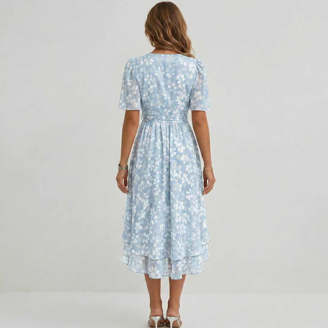 Elegant women's floral midi wrap dress. Short sleeve A-line cut for summer parties & special occasions.