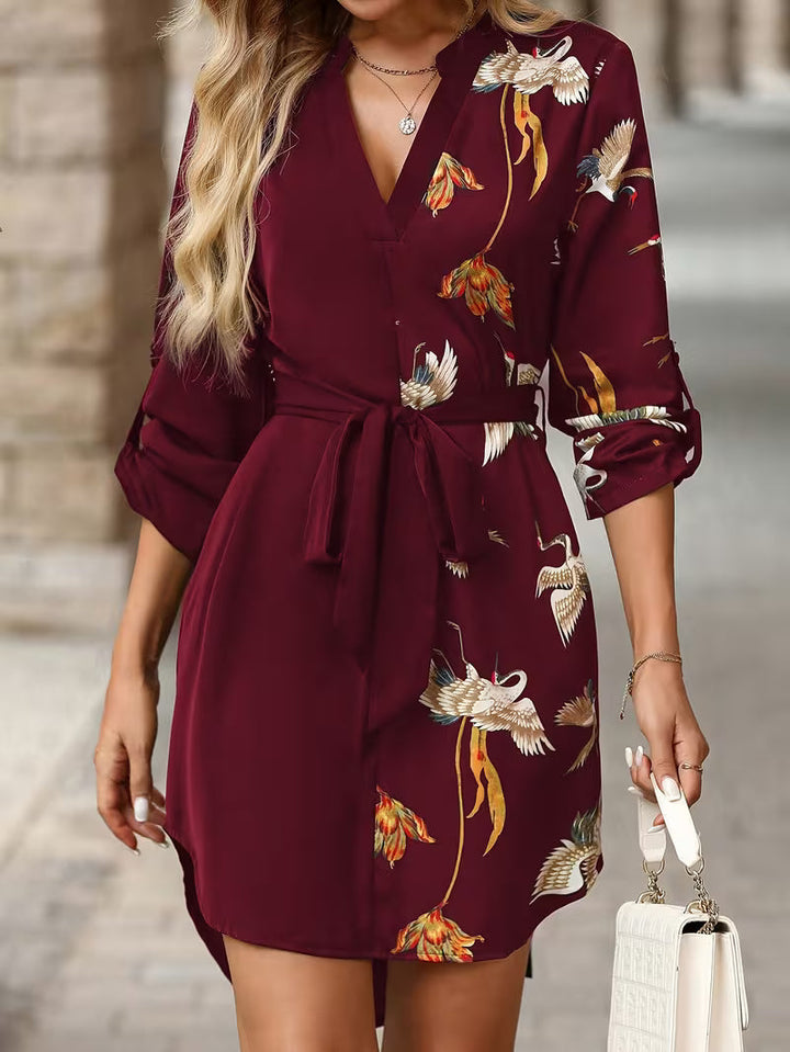 Beautiful women's floral print wrap mini dress. Flattering design, perfect for summer, casual, or elegant party occasions.