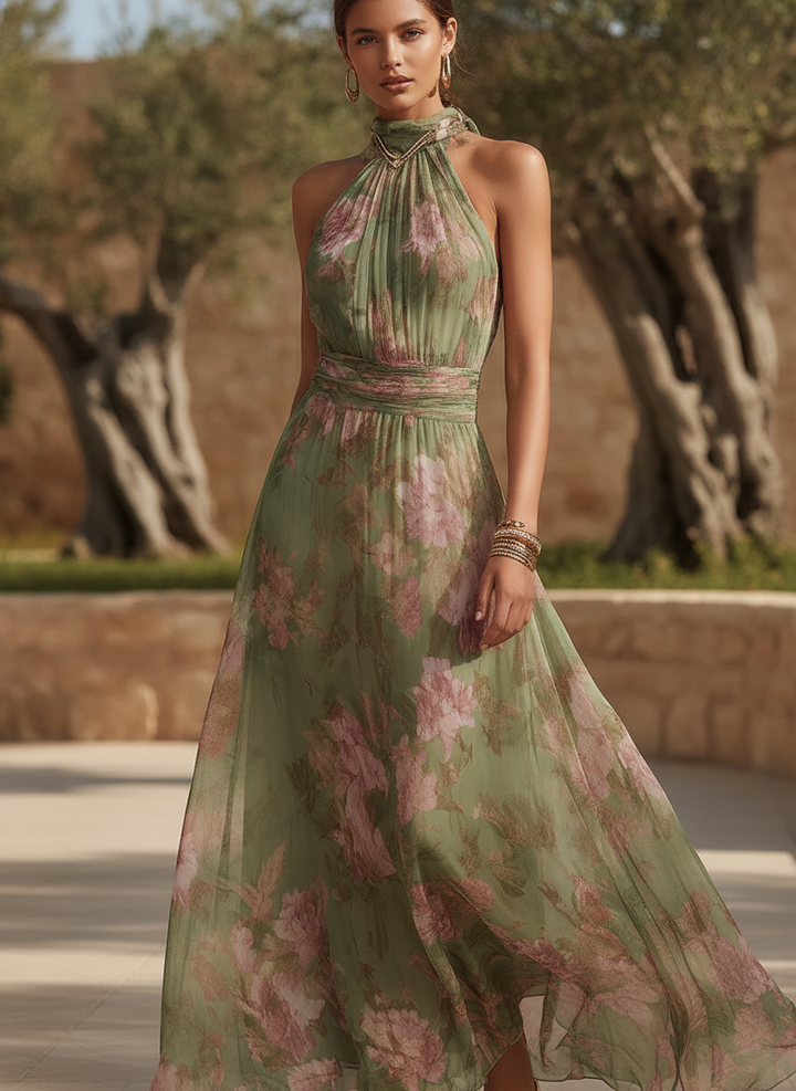 Women's elegant floral wrapped halter neck maxi dress, perfect for garden parties & summer occasions. Green, sleeveless.