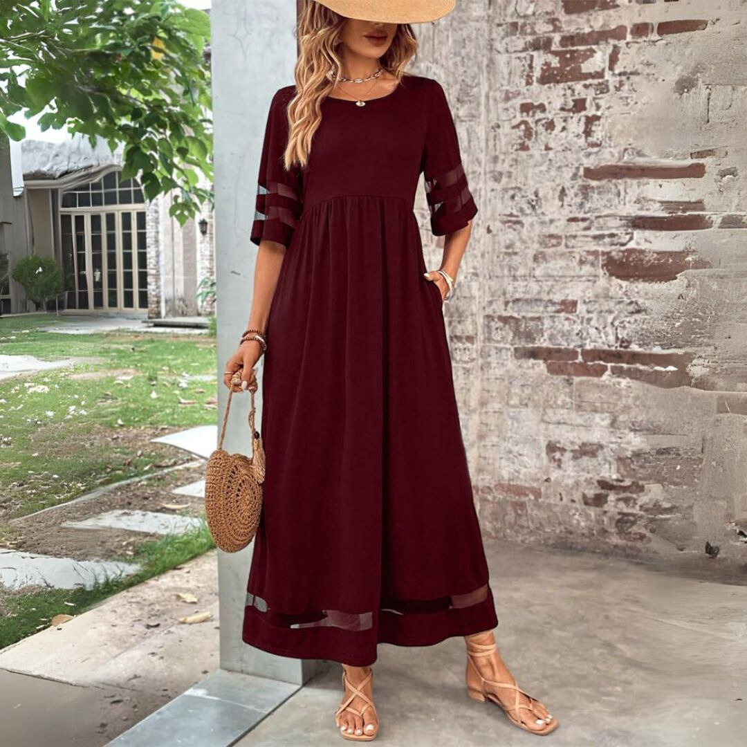 Lightweight & flowing black maxi dress, offering effortless elegance for women's summer or evening wear.
