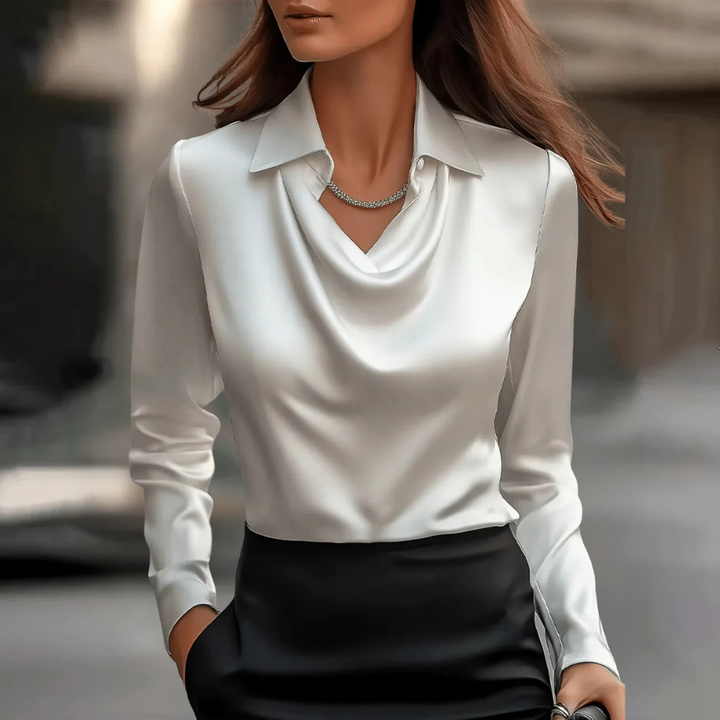 White elegant flowy blouse, versatile women's top for sophisticated office or casual chic.
