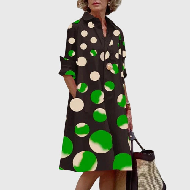 Soft, flowy women's dress with a flattering silhouette and handy pockets.