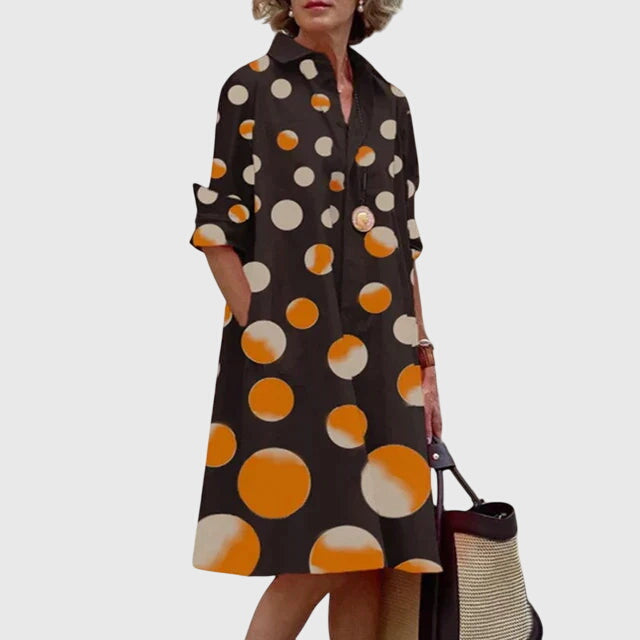 Effortlessly elegant women's flowy dress with pockets, a comfortable casual staple.