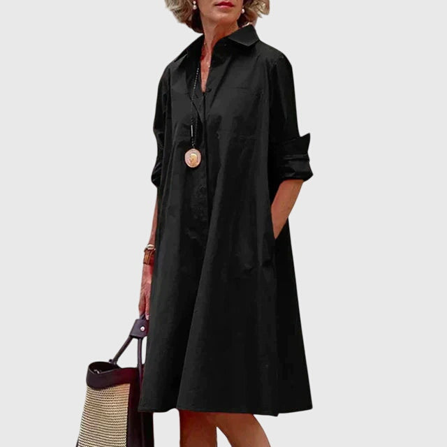 Comfortable, flowy women's dress with practical pockets, ideal for spring and summer.