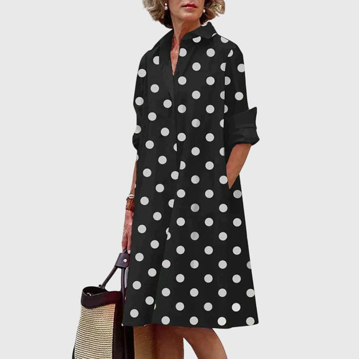 Pretty spring flowy dress for women, elegant design with functional pockets.