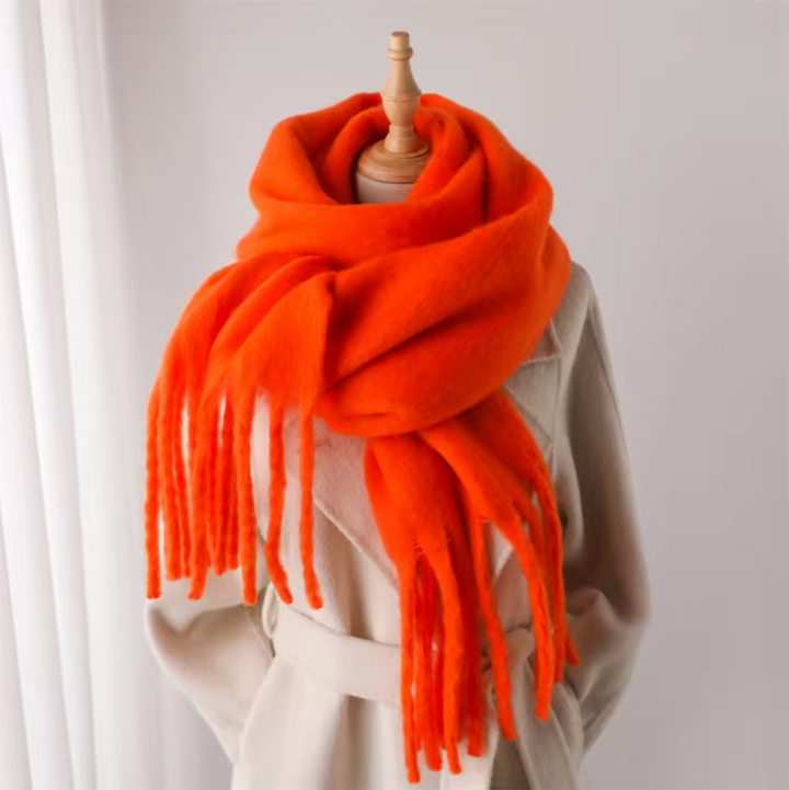 The perfect blend of style and warmth in a women's fringe winter scarf.